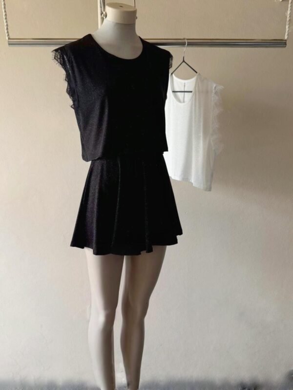 MUSC CORTA GLITTER CON PUNTILLA